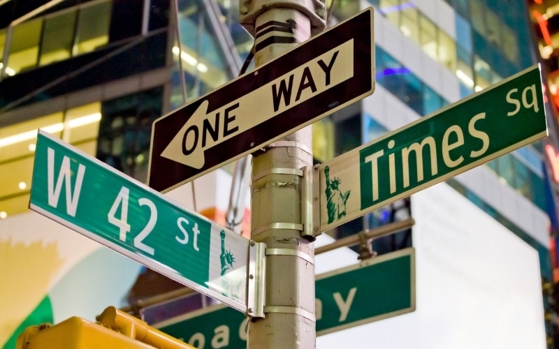 picture of new york street signs showing different directions representing getting a divorce in new york