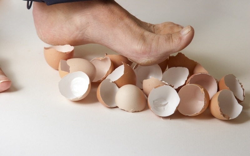 picture of a woman walking on egg shells around her narcissist husband