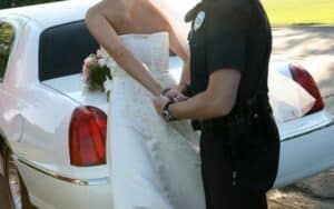 picture of a wife getting arrested for cheating on her husband
